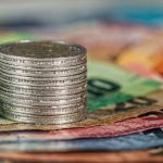 Funding - Assorted Banknotes and Round Silver-colored Coins