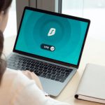 App Security - Woman Using Macbook Pro