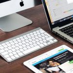 Web Development - Turned on Imac Beside Macbook on Table