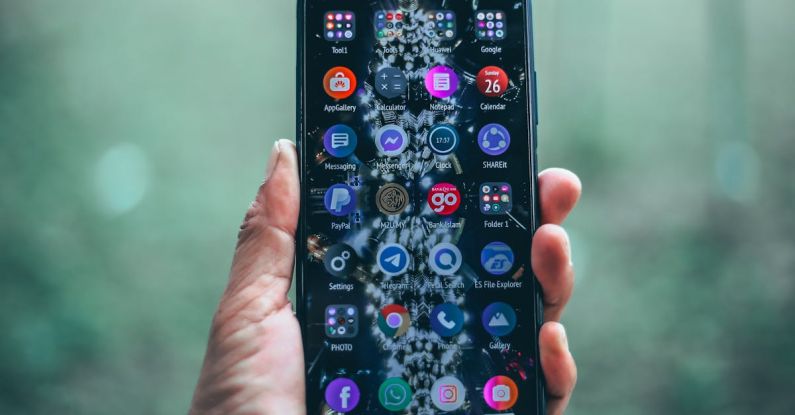 Web Apps - Crop person holding modern mobile phone