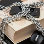 Password Managers - Black Android Smartphone on Top of White Book