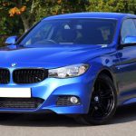 Licenses - Blue Bmw Sedan Near Green Lawn Grass